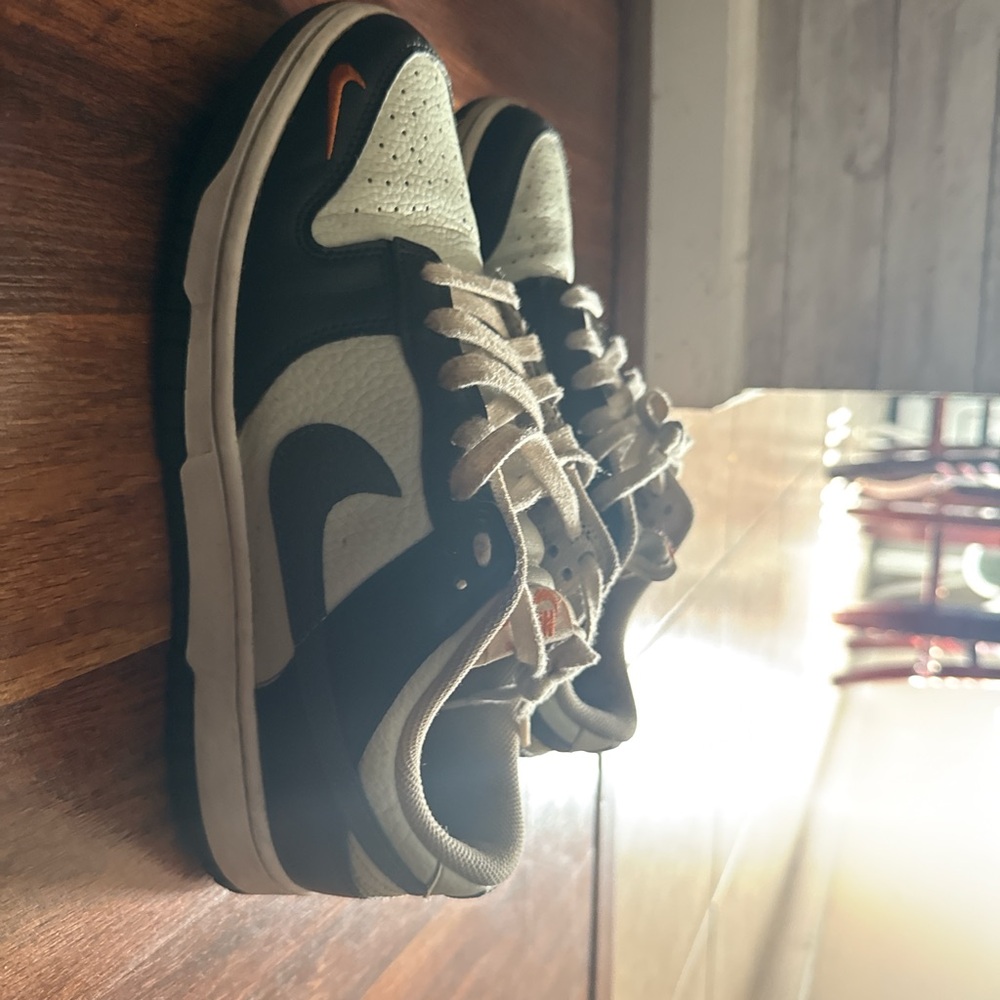 Black and White Sneakers with Orange Accents